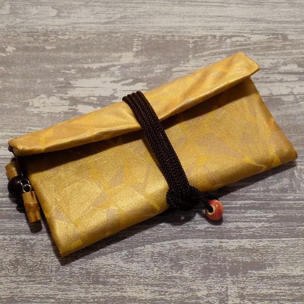 金彩工芸　特別仕様　モザイク金仕上げ　コットンむら染黄色地製　「道中財布」1枚目の画像